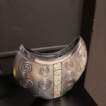 S5717; Cresent vase; Sharon Hindle; Silver plated.